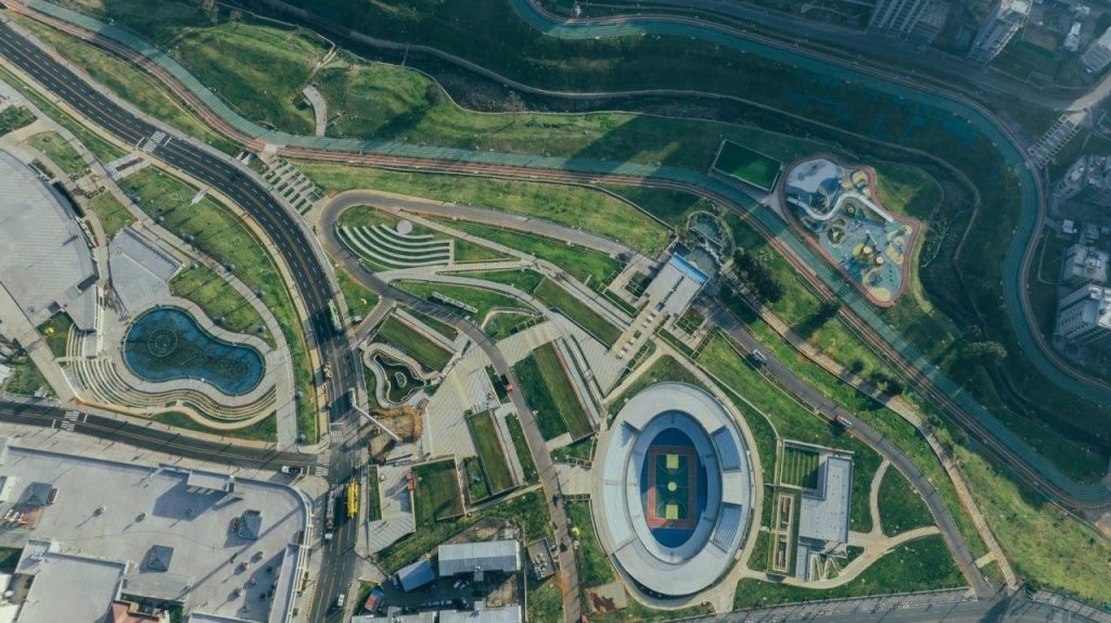 Large-Scale Urban Development and Economic Transformation